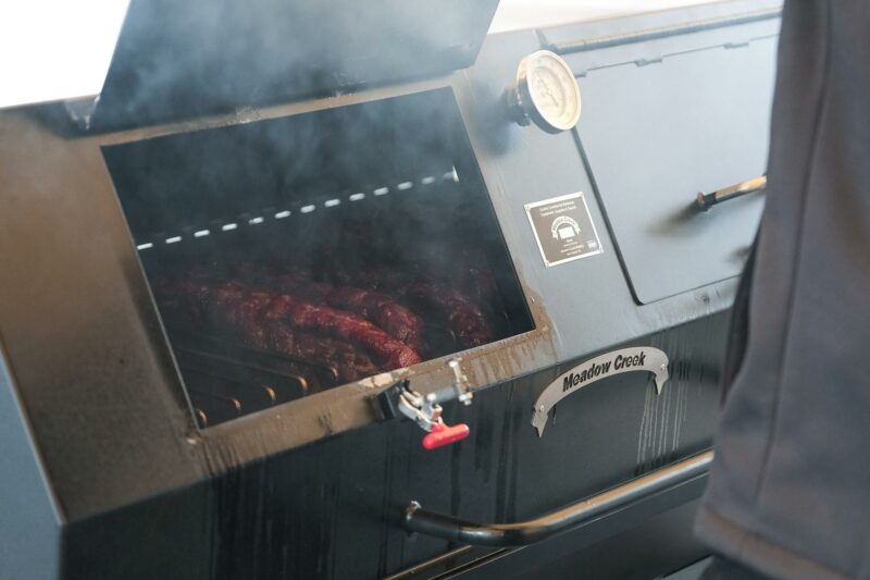 Smoked Pork Ribs on a Meadow Creek Pig Roaster Smoked Pork Ribs on a Meadow Creek Pig Roaster