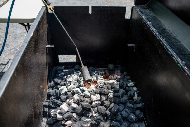 Firing Charcoal on Meadow Creek BBQ42 Chicken Cooker Firing Charcoal on Meadow Creek BBQ42 Chicken Cooker