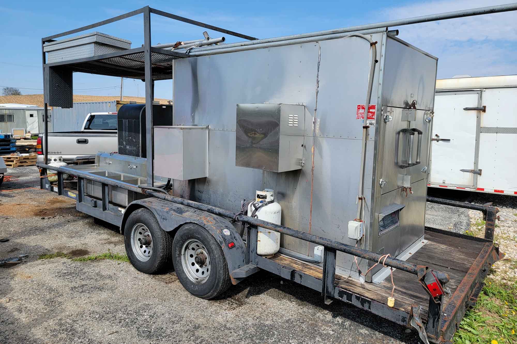 20' Double-Axle Trailer With SPK1400 Southern Pride 20' Double-Axle Trailer with SPK 1400 Southern Pride, Old Hickory Smoker 100, 3-Bowl Sink, and Tent Parts